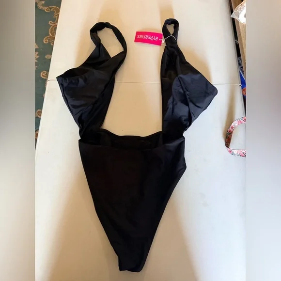 HYPERFIRE Sexy Halter Criss Cross Cut Out One Piece Bathing Suit.
Size M - Picture 7 of 11